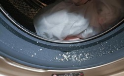 洗衣机白色粉（洗衣机里白色碎末）