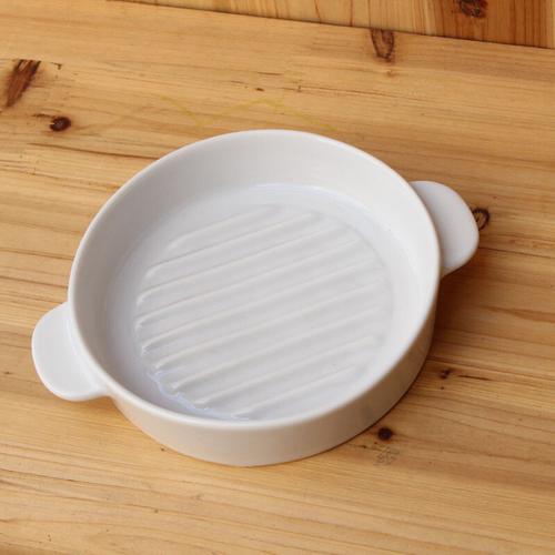 白色陶瓷烤盘清洗（白色陶瓷烤盘清洗视频）-图1
